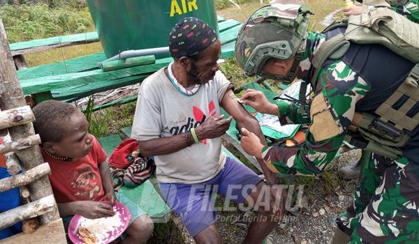 Prajurit Ksatria Condromowo melaksanakan kegiatan membantu masyarakat yang berada di sekitar pos