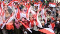 Pemkab Mojokerto Bagikan 1500 Bendera Merah Putih di Desa Tanjungan