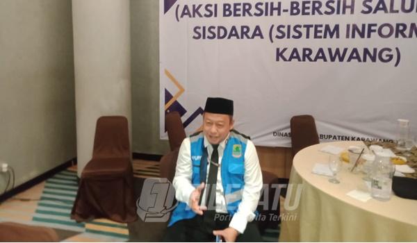 Kepala Dinas PUPR Karawang Rusman Kusnadi, ST