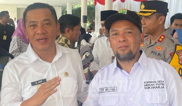 Ketua Koperasi Merah Putih Desa Sukaharja H. Asep Mulyana bersama Bupati Karawang